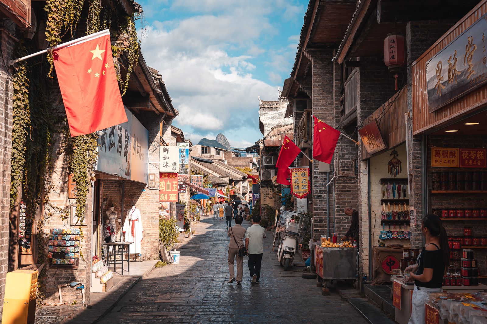 A busy street market in Xingping ancient town