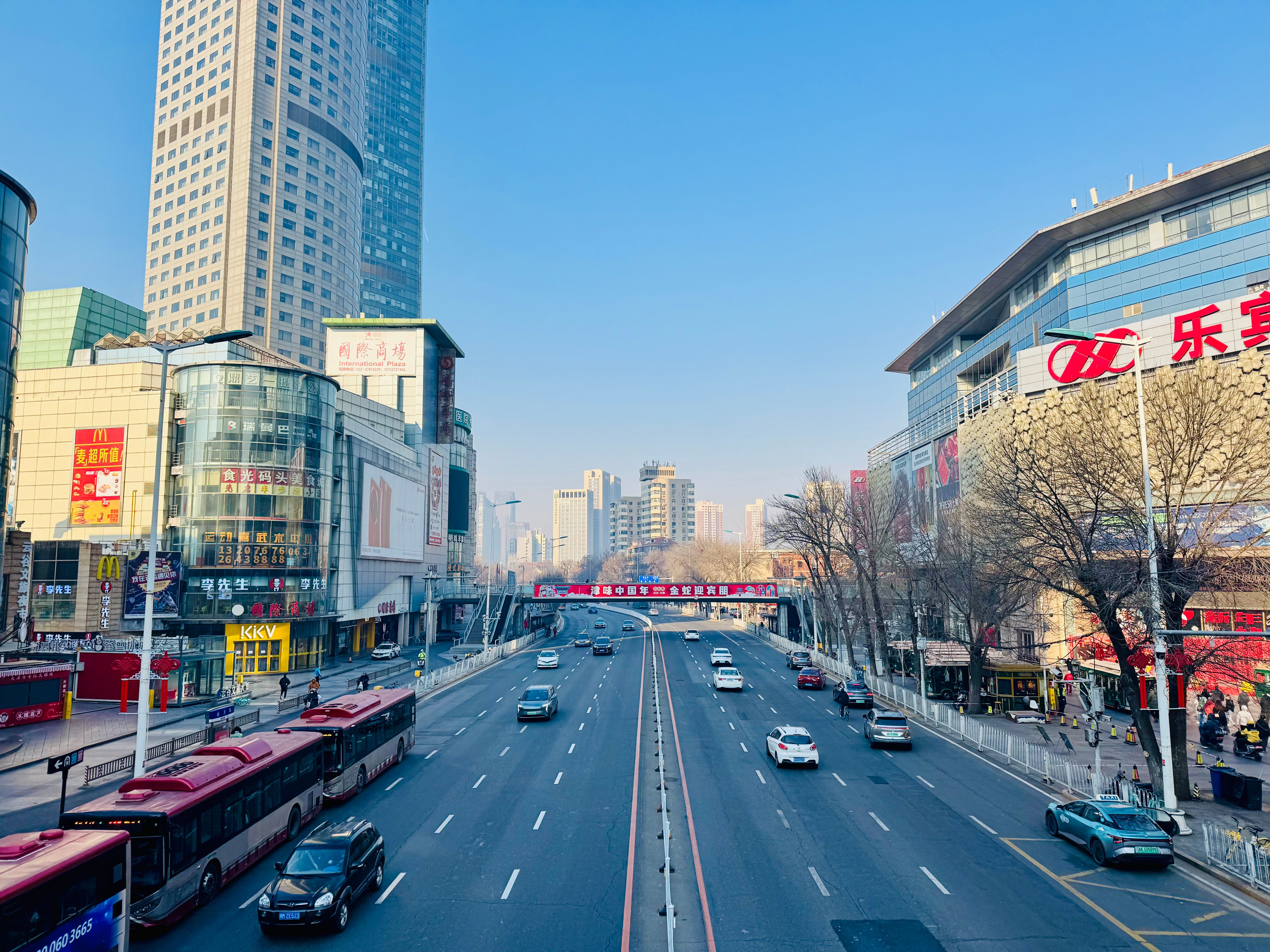 A busy downtown shopping street in Tianjin