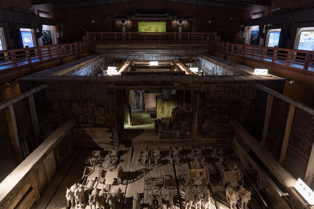 A Chinese archaeological museum hall with historical artifacts
