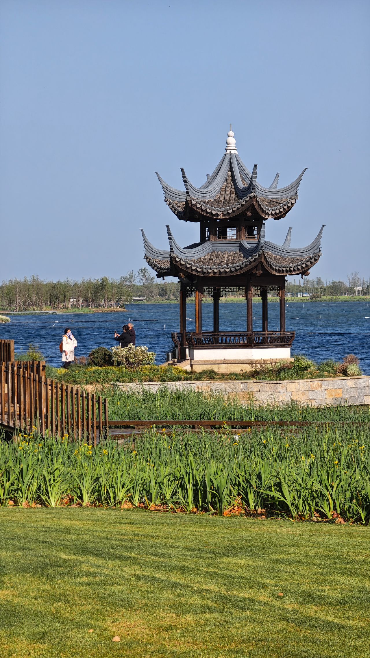 A traditional pagoda by a serene lake in Xi'an