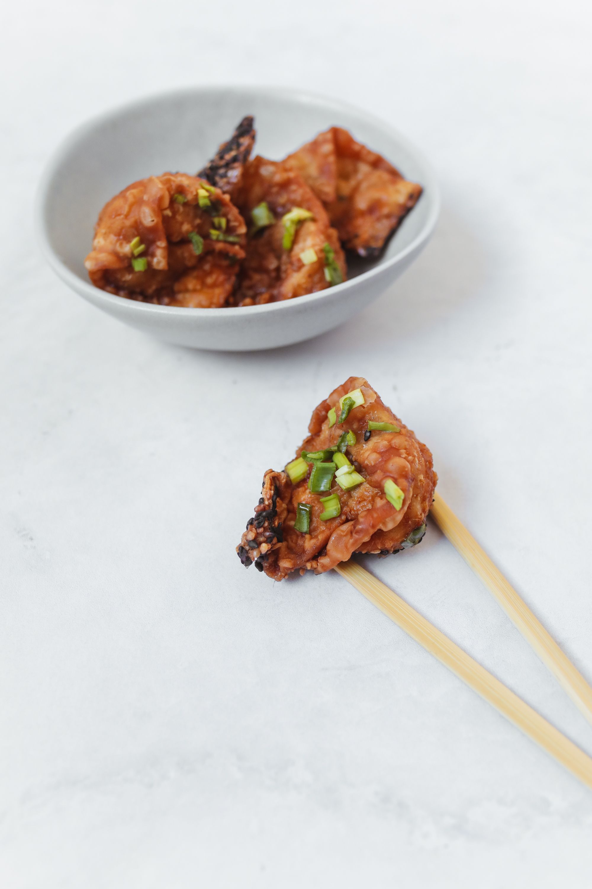 Fried food served on a white ceramic bowl