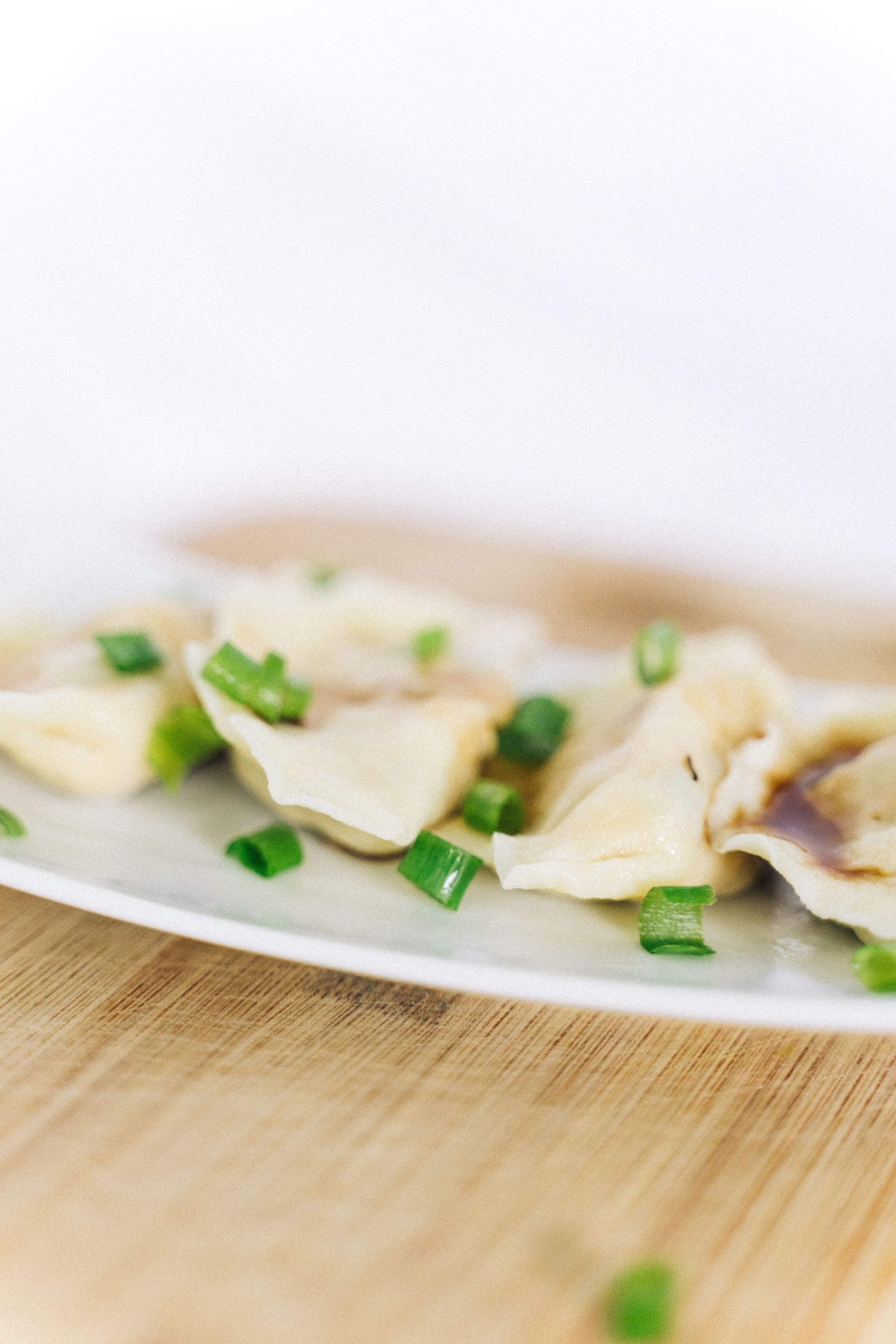 Dumplings on a white ceramic plate
