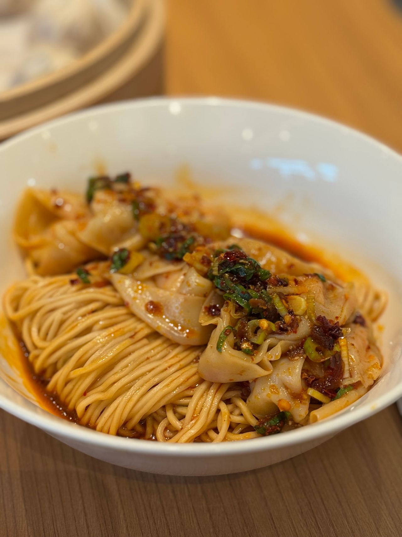 A bowl of spicy hand-pulled Chinese noodles with chilli oil