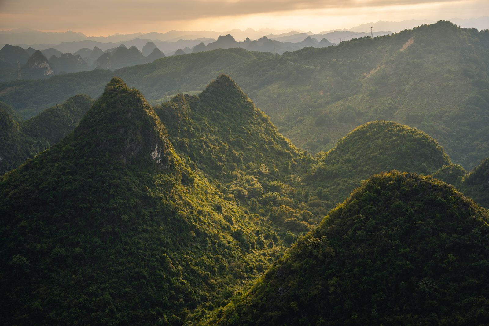 Karst mountains above the Li River at sunset near Guilin