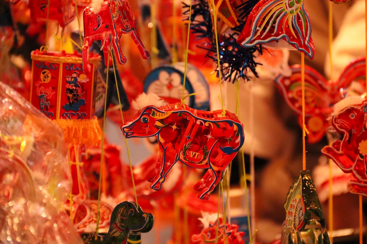 A display of colourful Chinese paper-cut decorations
